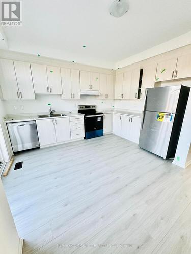 211 Monarch Avenue, Ajax, ON - Indoor Photo Showing Kitchen With Double Sink