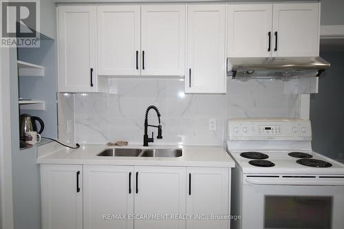 701 Wilson Street, Hamilton, ON - Indoor Photo Showing Kitchen With Double Sink