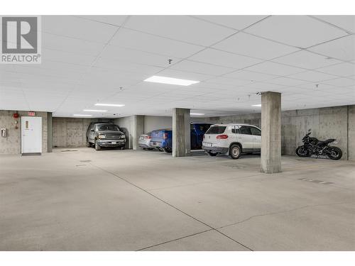 Secured Parking Stall - 255 Aurora Crescent Unit# 304, Kelowna, BC - Indoor Photo Showing Garage