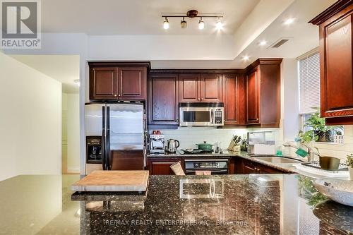 310 - 77 Mcmurrich Street, Toronto, ON - Indoor Photo Showing Kitchen