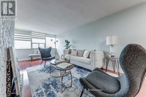 709 - 25 Silver Springs Boulevard, Toronto, ON - Indoor Photo Showing Living Room