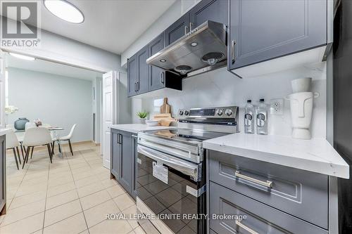 709 - 25 Silver Springs Boulevard, Toronto, ON - Indoor Photo Showing Kitchen With Upgraded Kitchen