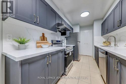 709 - 25 Silver Springs Boulevard, Toronto, ON - Indoor Photo Showing Kitchen