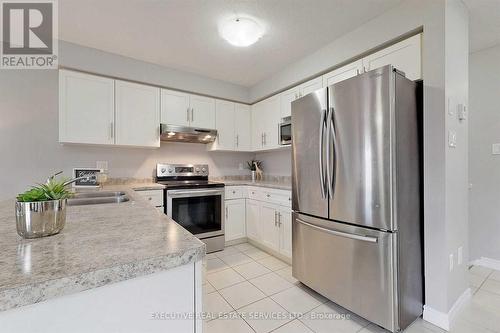 9 Mccann Street, Guelph, ON - Indoor Photo Showing Kitchen With Double Sink