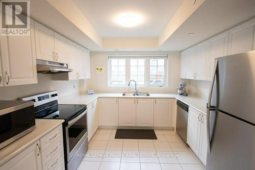 74 - 2751 Deputy Minister Path, Oshawa (Windfields), ON - Indoor Photo Showing Kitchen With Stainless Steel Kitchen With Double Sink