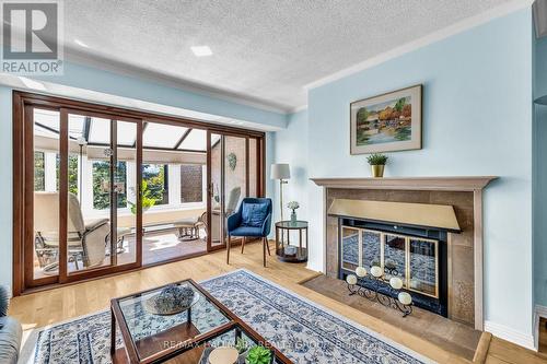 87D - 263 Botanica Pvt, Ottawa, ON - Indoor Photo Showing Living Room With Fireplace