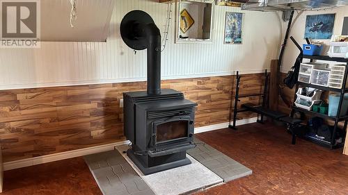 63 Seal Cove Road, Stephenville Crossing, NL - Indoor Photo Showing Other Room With Fireplace