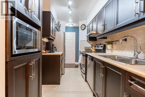 202 - 897 Sheppard Avenue W, Toronto (Clanton Park), ON - Indoor Photo Showing Kitchen With Double Sink