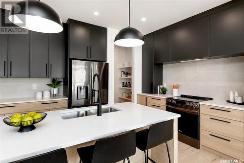 146 Katz Avenue, Saskatoon, SK - Indoor Photo Showing Kitchen With Double Sink With Upgraded Kitchen