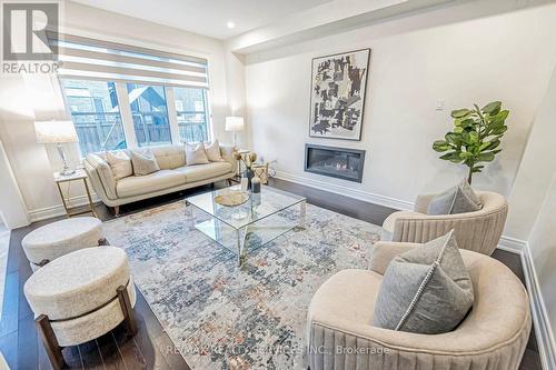 5 Sinatra Street, Brampton, ON - Indoor Photo Showing Living Room With Fireplace