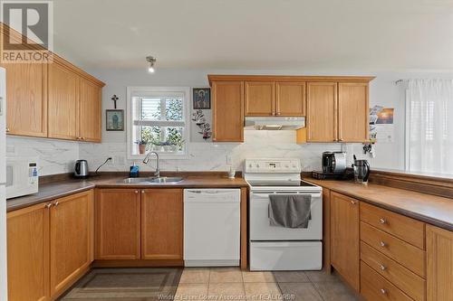 1082 Monarch Meadows, Lakeshore, ON - Indoor Photo Showing Kitchen With Double Sink