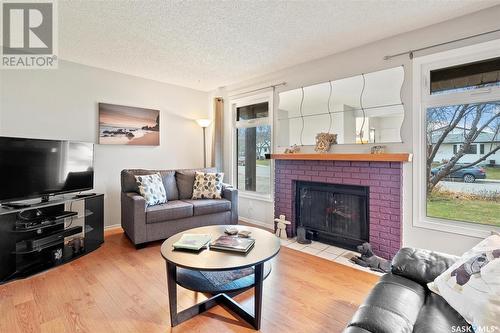 215 La Ronge Road, Saskatoon, SK - Indoor Photo Showing Living Room With Fireplace