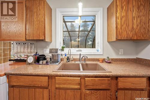 215 La Ronge Road, Saskatoon, SK - Indoor Photo Showing Kitchen With Double Sink