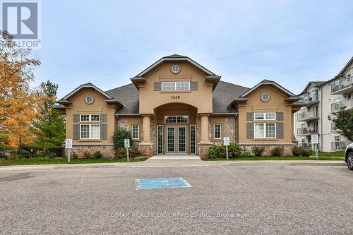 103 - 1460 Bishops Gate, Oakville, ON - Outdoor With Facade