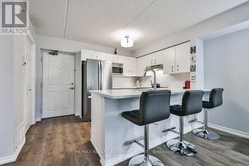 103 - 1460 Bishops Gate, Oakville, ON - Indoor Photo Showing Kitchen With Stainless Steel Kitchen With Upgraded Kitchen