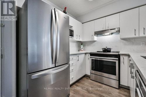 103 - 1460 Bishops Gate, Oakville, ON - Indoor Photo Showing Kitchen With Stainless Steel Kitchen With Upgraded Kitchen