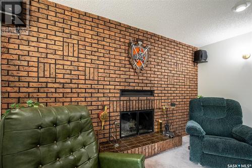 1 Calypso Drive, Moose Jaw, SK - Indoor Photo Showing Living Room With Fireplace