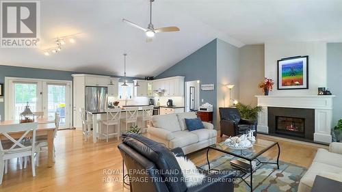 8846 Timberwood Trail, Lambton Shores (Grand Bend), ON - Indoor Photo Showing Living Room With Fireplace