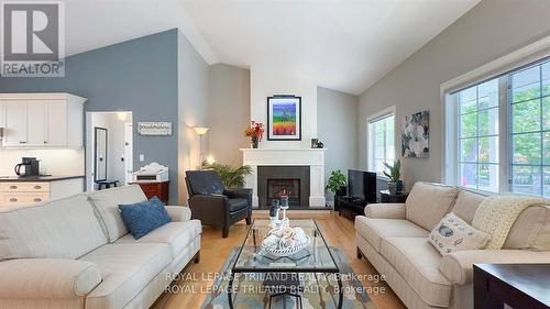 8846 Timberwood Trail, Lambton Shores (Grand Bend), ON - Indoor Photo Showing Living Room With Fireplace