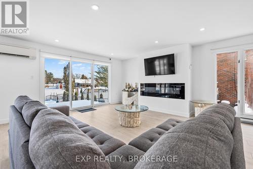 72 Willowbank Road W, Gananoque, ON - Indoor Photo Showing Living Room With Fireplace