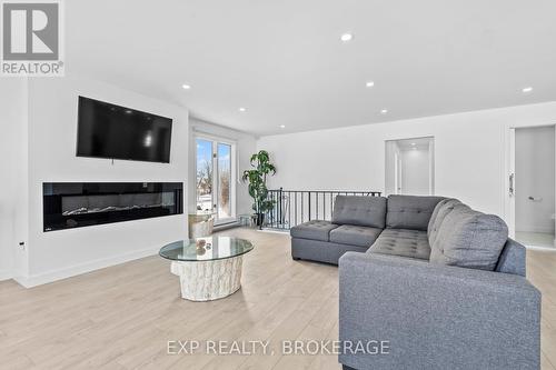 72 Willowbank Road W, Gananoque, ON - Indoor Photo Showing Living Room With Fireplace