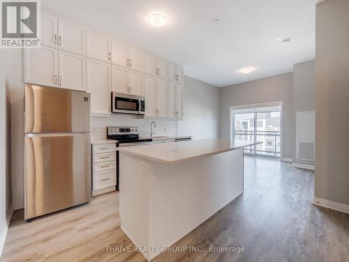 632 - 102 Grovewood Common, Oakville, ON - Indoor Photo Showing Kitchen With Stainless Steel Kitchen