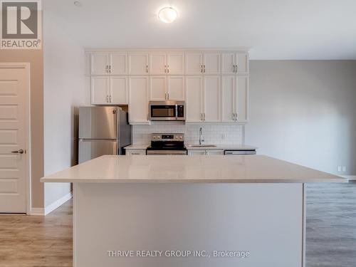 632 - 102 Grovewood Common, Oakville, ON - Indoor Photo Showing Kitchen With Stainless Steel Kitchen