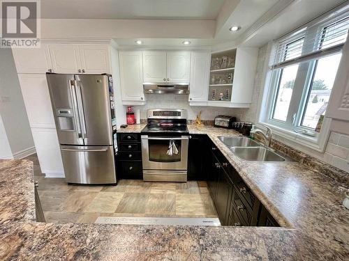 253 Crystal Crescent, Temiskaming Shores, ON - Indoor Photo Showing Kitchen With Double Sink