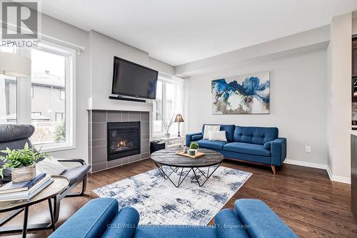 521 Rouncey Road, Ottawa, ON - Indoor Photo Showing Living Room With Fireplace