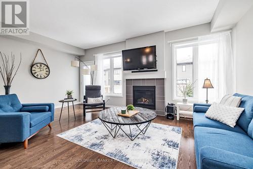 521 Rouncey Road, Ottawa, ON - Indoor Photo Showing Living Room With Fireplace