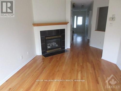 150 Blackdome Crescent, Ottawa, ON - Indoor Photo Showing Living Room With Fireplace