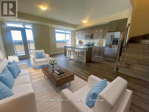 116 - 1565 Rose Way, Milton, ON - Indoor Photo Showing Living Room