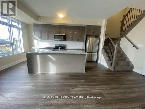 116 - 1565 Rose Way, Milton, ON - Indoor Photo Showing Kitchen With Double Sink