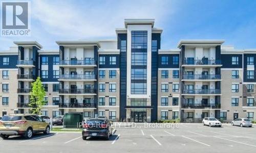 409 - 650 Sauve Street, Milton, ON - Outdoor With Balcony With Facade