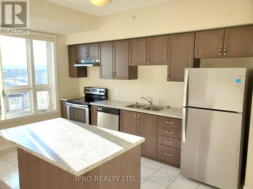 409 - 650 Sauve Street, Milton, ON - Indoor Photo Showing Kitchen With Double Sink