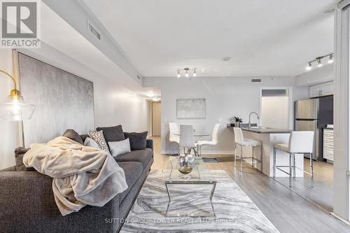 711 - 280 Donlands Avenue, Toronto, ON - Indoor Photo Showing Living Room