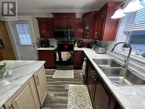 10-14 Irishtown Road, Carbonear, NL - Indoor Photo Showing Kitchen With Double Sink