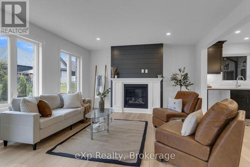 516 Newfoundland Street, Wellington North (Mount Forest), ON - Indoor Photo Showing Living Room With Fireplace