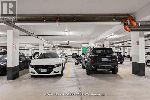 108 - 65 Oneida Crescent, Richmond Hill, ON - Indoor Photo Showing Garage