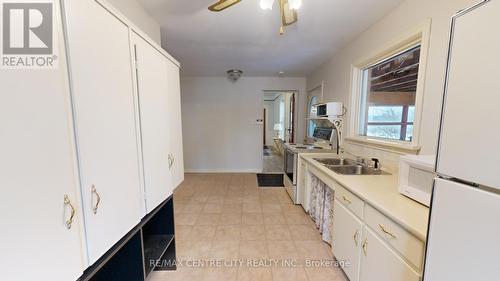 821 Wharncliffe Road S, London, ON - Indoor Photo Showing Kitchen With Double Sink