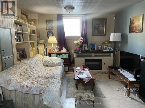 128 Adolphus Street, Cornwall, ON - Indoor Photo Showing Bedroom With Fireplace