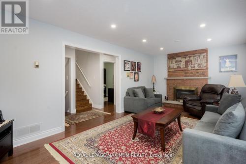 44 Flagstick Court, Toronto, ON - Indoor Photo Showing Living Room With Fireplace