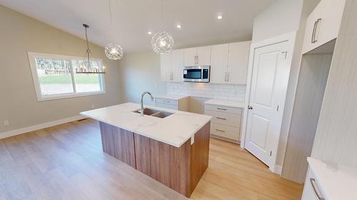 331 Legacy Lookout, Cranbrook, BC - Indoor Photo Showing Kitchen With Double Sink