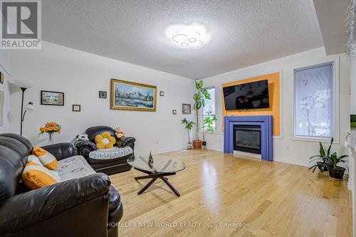 18 Amaretto Court, Brampton, ON - Indoor Photo Showing Living Room With Fireplace