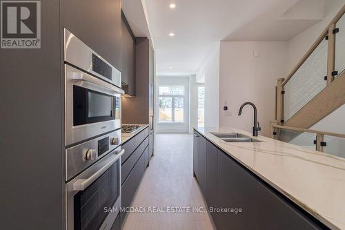 9 - 10 Lou Parsons Way, Mississauga, ON - Indoor Photo Showing Kitchen With Double Sink