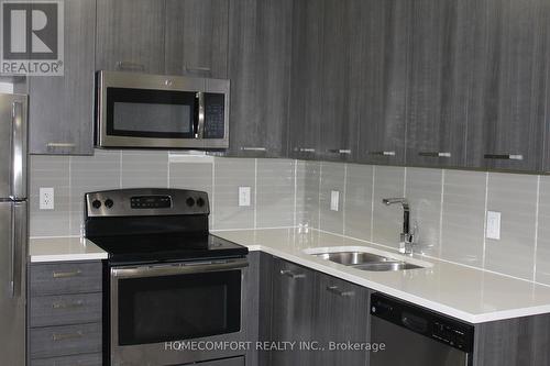 707 - 150 Main Street W, Hamilton, ON - Indoor Photo Showing Kitchen With Double Sink With Upgraded Kitchen