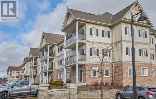 107 - 1 Sidney Lane, Clarington (Bowmanville), ON - Outdoor With Balcony With Facade