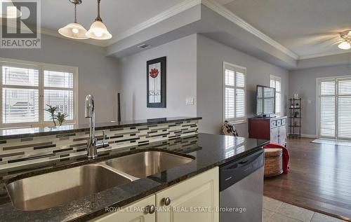 107 - 1 Sidney Lane, Clarington (Bowmanville), ON - Indoor Photo Showing Kitchen With Double Sink