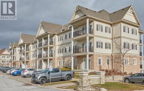 107 - 1 Sidney Lane, Clarington (Bowmanville), ON - Outdoor With Balcony With Facade