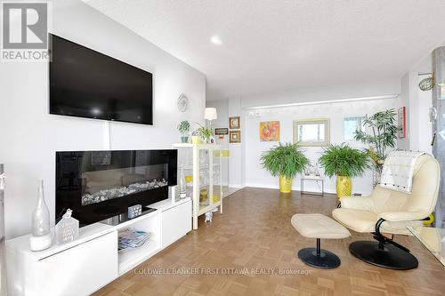 1707 - 2625 Regina Street, Ottawa, ON - Indoor Photo Showing Living Room With Fireplace